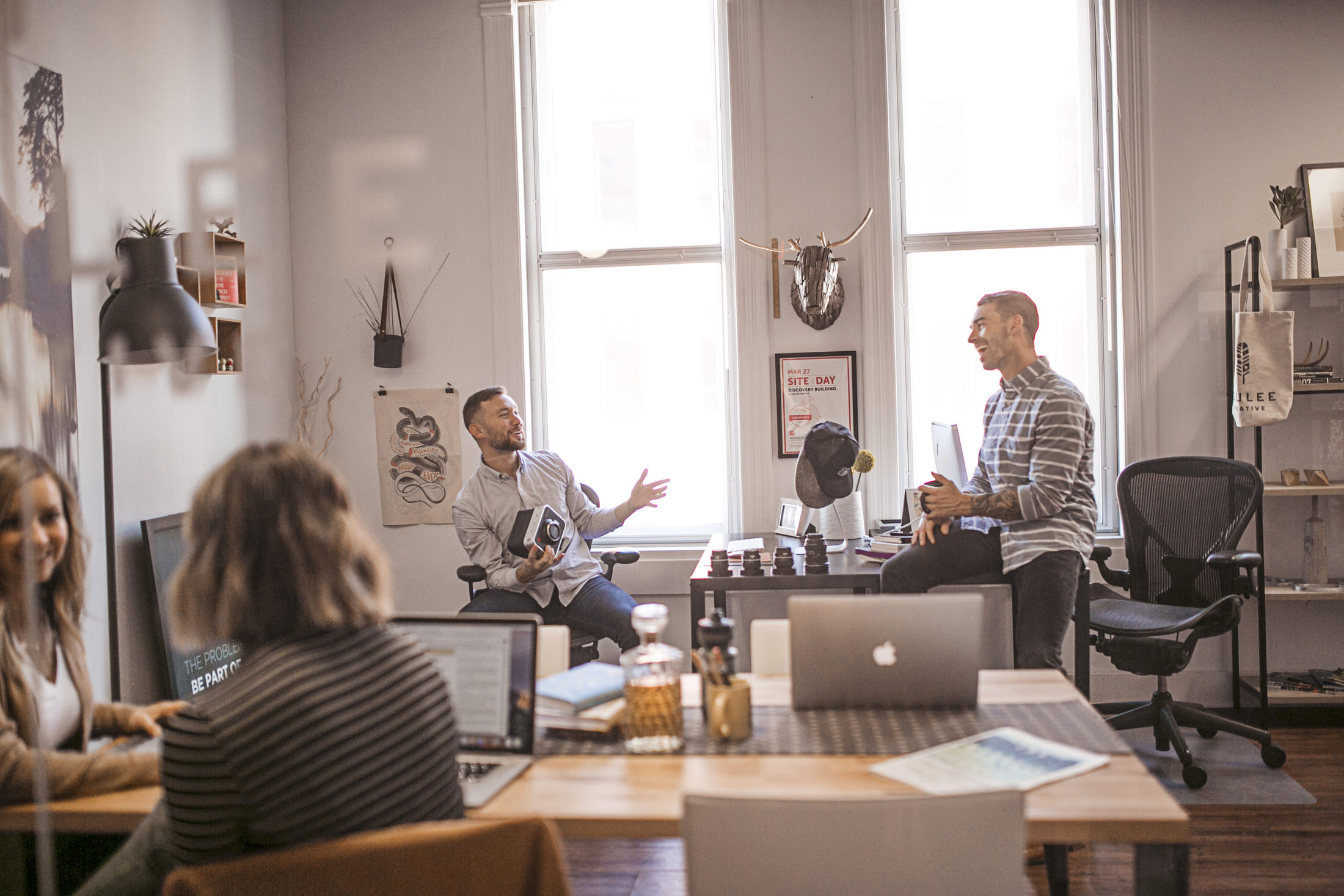 people working together web design agency