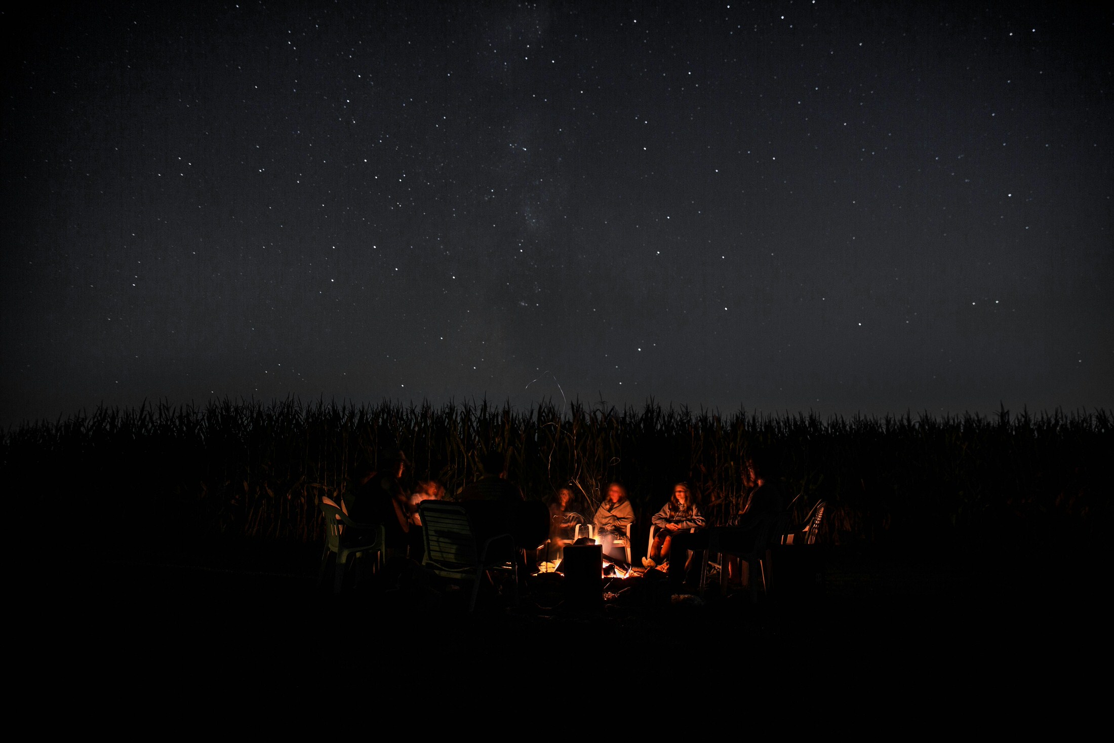 telling story around campfire