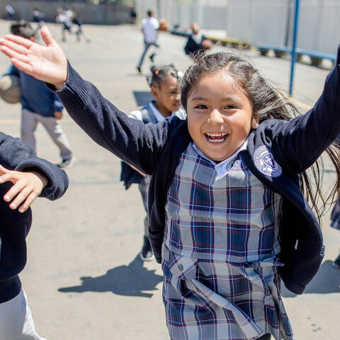 kids running with hands up