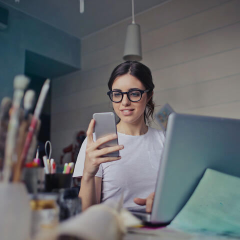 girl using trov insurance app on phone
