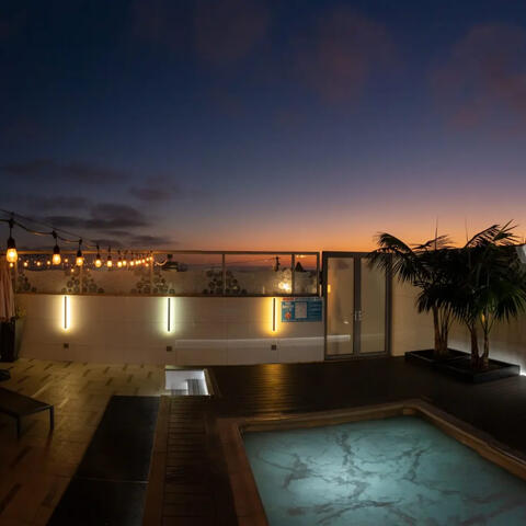 shade hotel at sunset at rooftop pool